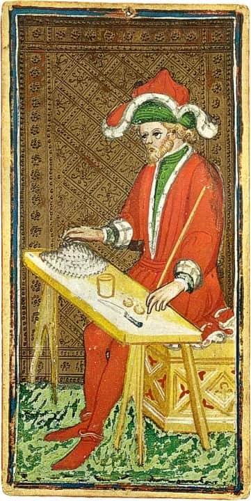 Visconti Sforza 塔罗复制图中的红衣魔术师坐在桌后